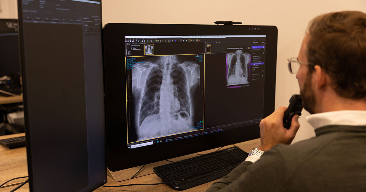 
  A radiologist reviewing an AI-generated chest X-ray analysis

