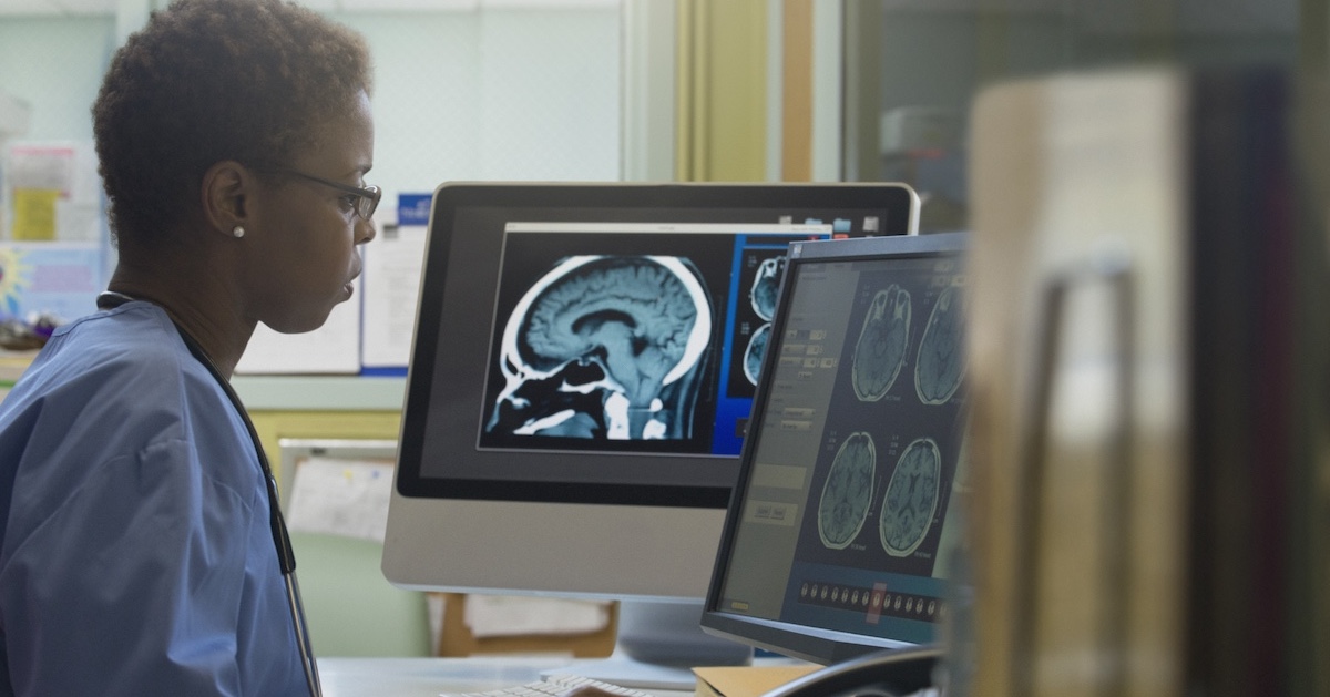 
  Healthcare professional reviewing imaging on a screen
