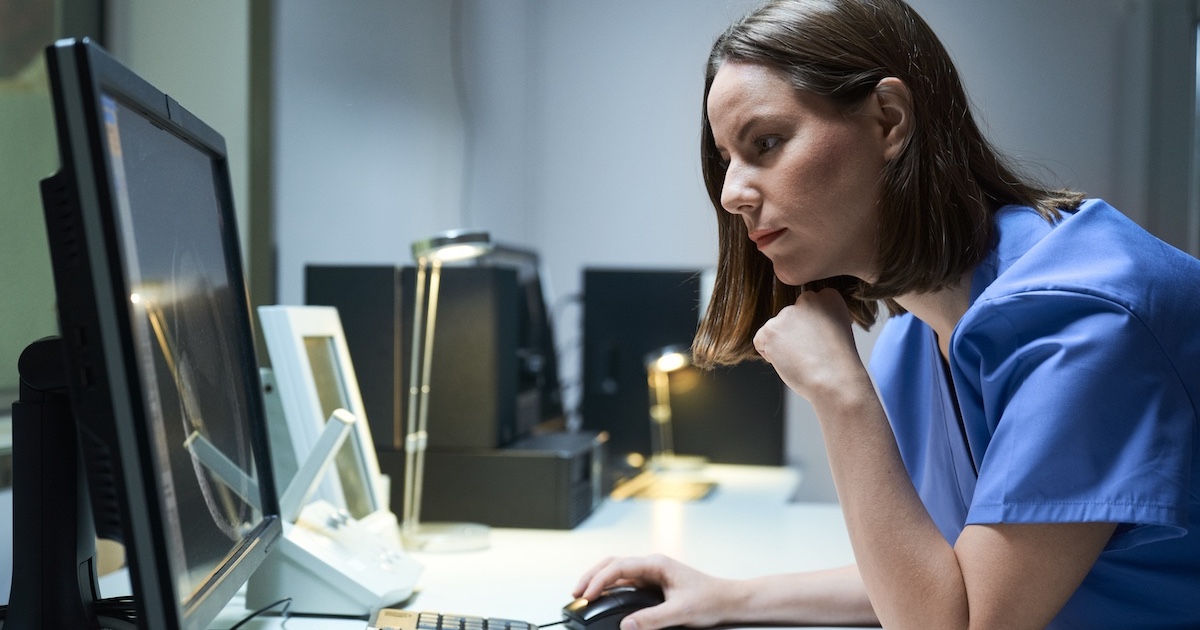 
  Healthcare professional reviewing data
