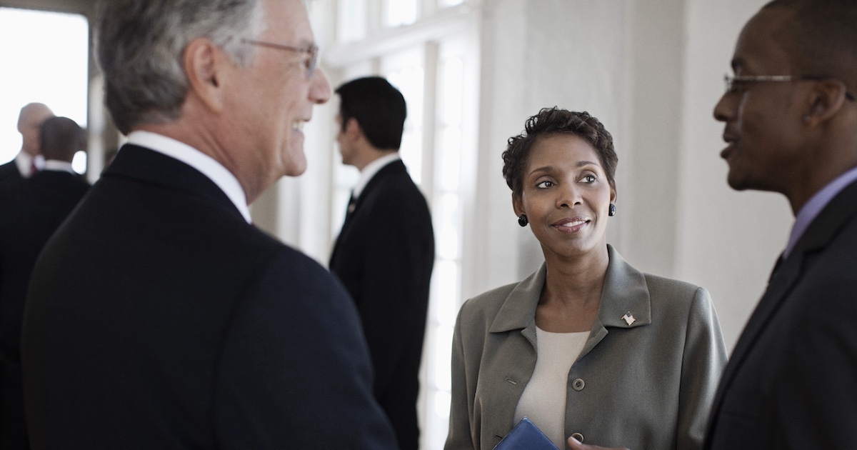 
  Executives conferring 
