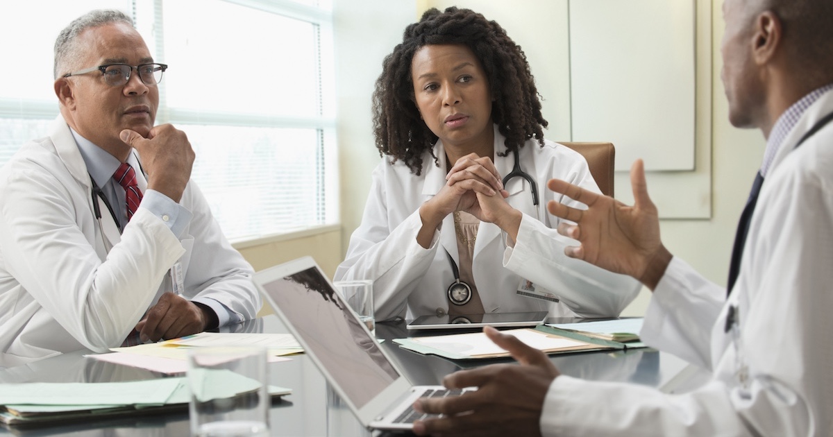 
  Healthcare professionals conferring 
