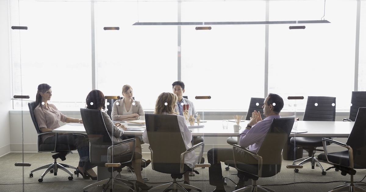 
  Executives meeting in a conference room

