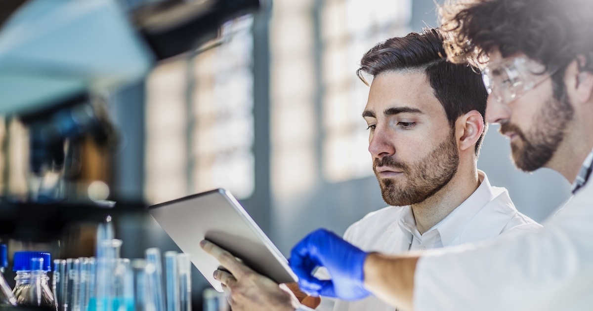 
  Two lab technicians at work
