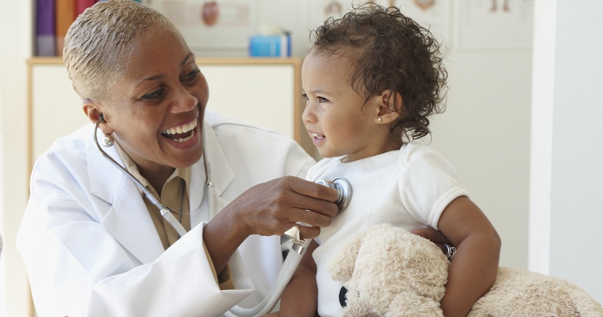 
  Healthcare professional with infant
