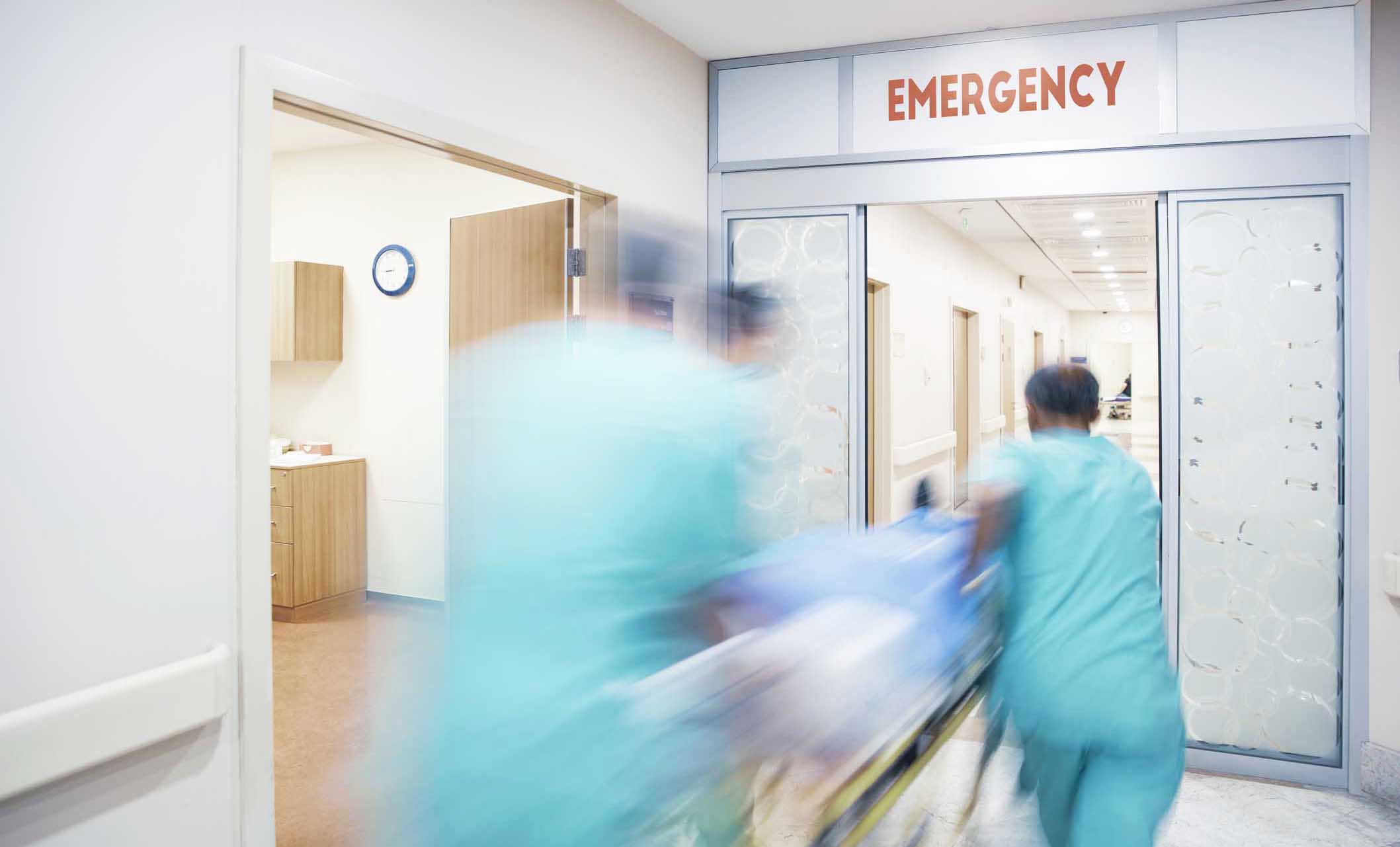 
  Physicians rushing into surgery
