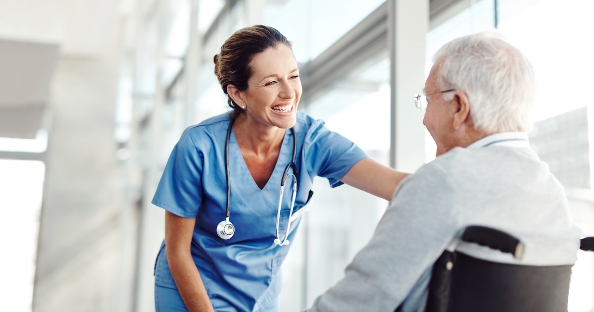 
  Healthcare professional with senior adult
