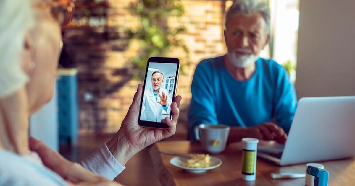 
  Patient interacting with healthcare professional via smart phone
