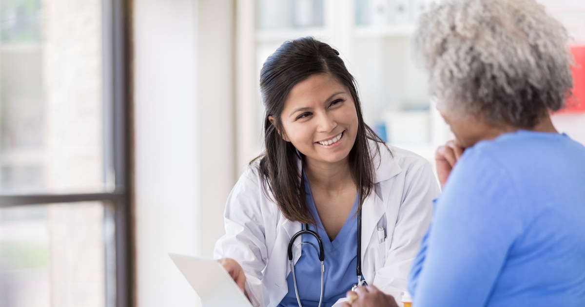 
  Healthcare professional counseling patient 
