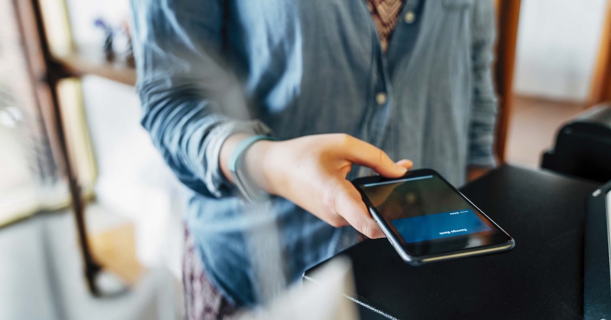 
  Person using their phone

