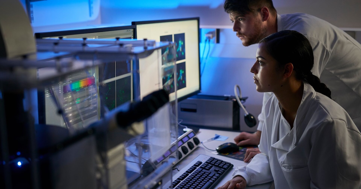 
  Healthcare professionals reviewing data on a computer 
