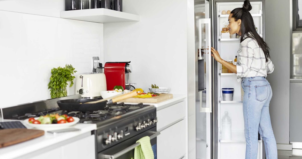 
  Person looking into a refrigerator
