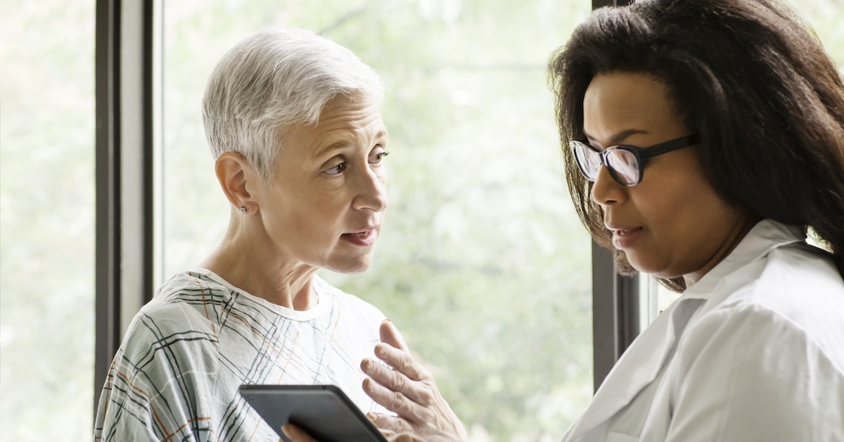 
  Healthcare professional consulting with a patient
