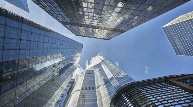 
  Photo looking up at the top of skyscrapers
