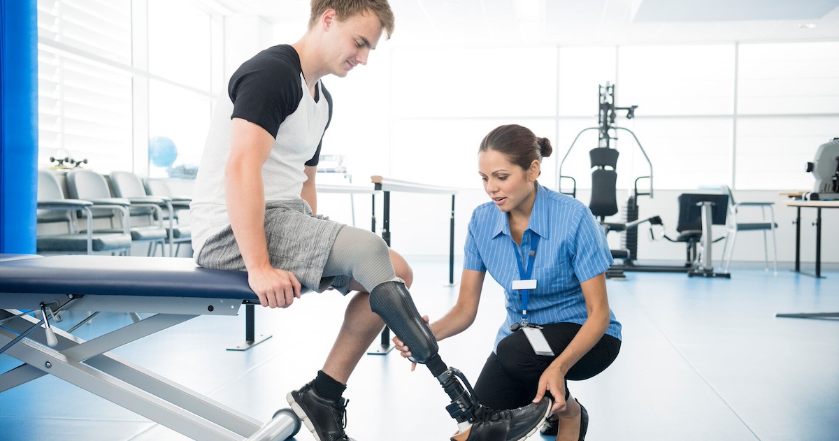 
  Amputee with a physical therapist
