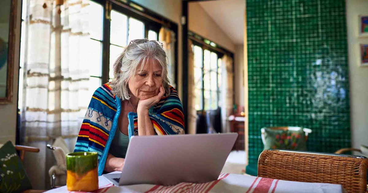 Person in their home on a computer