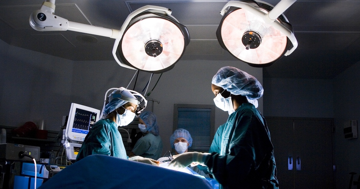 Surgeons in an operating room Surgeons in an operating room