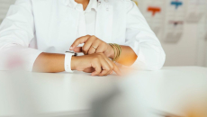 Person wearing a watch and looking at it