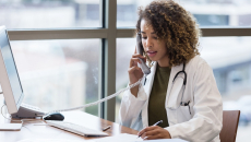 Healthcare professional talking to someone on the phone