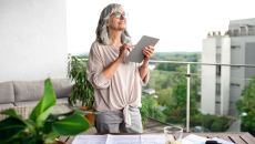 woman reviewing health information on a tablet