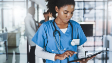 Healthcare provider on a tablet