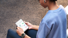 Person wearing a Samsung Galaxy Watch and looking at Samsung's Health App