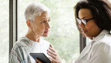 An elderly patient consulting with a doctor