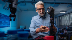 Robotics engineer working on the prosthetic for an arm