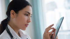 Healthcare provider on a tablet