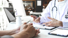 An in-person consultation between a patient and a doctor
