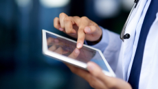 Healthcare provider on a tablet