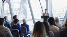 Person addressing business meeting