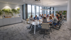 People sitting around a table in a conference room