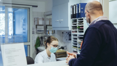 Healthcare professional interacting with patient