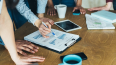 Executives reviewing data