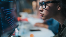 Person reviewing data on a PC