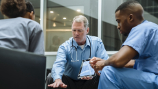 Physicians reviewing data