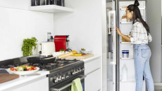 Person looking into a refrigerator