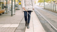 Person walking with a cane