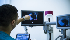 Radiologist reviewing mammogram results