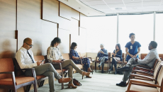 Patients sitting in a waiting room
