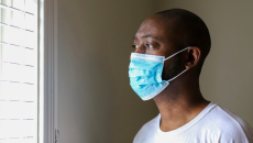 Person wears a mask