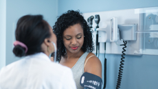 Doctor talks to patient