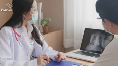 A doctor explaining to a patient some findings from their chest x-ray