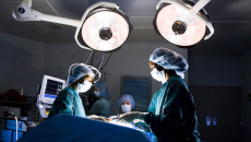 Clinicians performing surgery