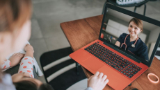 A person talking to a provider on a video chat.