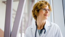Doctor standing in an industrial building