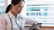 Healthcare provider on a tablet