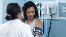 A person getting a blood pressure check during a medical appointment