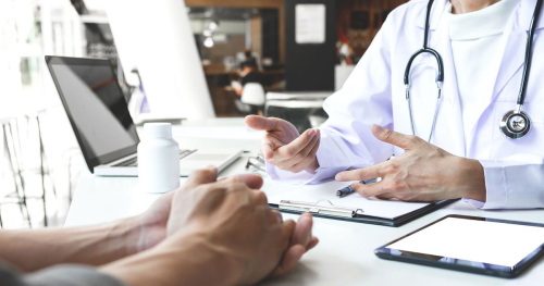 An in-person consultation between a patient and a doctor