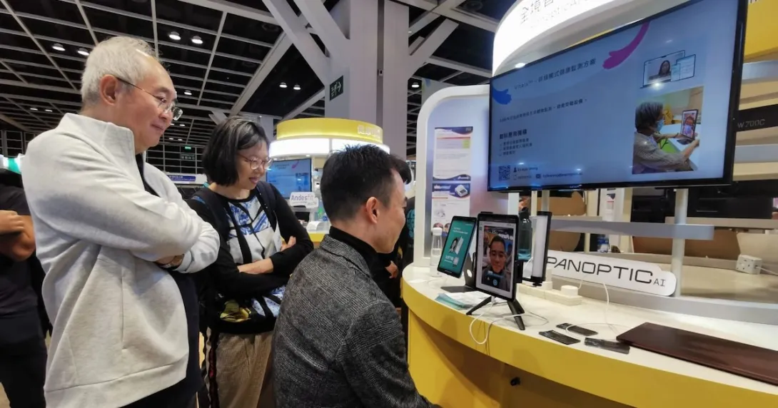 A person using PanopticAI's mobile application in a showcase in Hong Kong